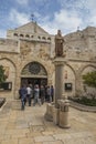 City of Bethlehem. The church Catherine next to the Basilica of the Nativity of Jesus Christ. Column with the figure of Saint Royalty Free Stock Photo