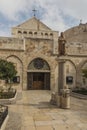 City of Bethlehem. The church Catherine next to the Basilica of the Nativity of Jesus Christ. Column with the figure of Saint