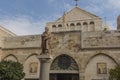 City of Bethlehem. The church Catherine next to the Basilica of the Nativity of Jesus Christ. Column with the figure of Saint Royalty Free Stock Photo