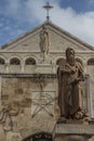 City of Bethlehem. The church Catherine next to the Basilica of the Nativity of Jesus Christ. Column with the figure of Saint