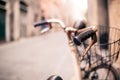 City bicycle handlebar, bike over blurred beautiful bokeh backgr Royalty Free Stock Photo