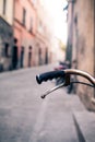 City bicycle handlebar, bike over blurred beautiful bokeh backgr Royalty Free Stock Photo