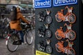 City biker matches the bicycle magnets in Utrecht