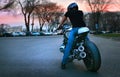 City biker rides his motorcycle