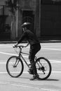 City biker on road black and white