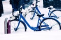 City bikes in the Parking lot covered with snow Royalty Free Stock Photo