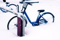 City bikes in the Parking lot covered with snow Royalty Free Stock Photo