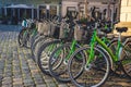 City bikes rent in big city. Ekological transport. Share-use bicycles in a  city centre. Royalty Free Stock Photo