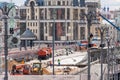 City bridge under reconstruction with workers and modern equipment