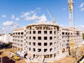 City building under construction and yellow tower crane. aerial Royalty Free Stock Photo