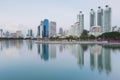 City building with water reflection in public park Royalty Free Stock Photo