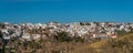 City buildings against the blue sky, Ronda, Province Malaga, Andalusia, Spain. Copy space for text