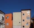 City buildings against deep blue sky