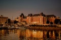 Golden hues of the late day sun illuminate the Inner Harbor of Victoria Canada Royalty Free Stock Photo