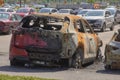 city burned cars after a fire in one of the city\'s districts