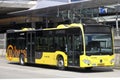 City bus in yellow color of U-OV runned by Qbuzz in Utrecht