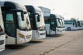 City buses in the parking lot at the bus station