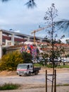 City Canvas - Lisbon\'s Bridge, Graffiti Portrait, and Utility Car