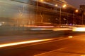 City car night lights perspective blurred by high speed, light trails background Royalty Free Stock Photo