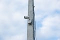 City cctv security surveillance camera system attached on the pole with clear blue sky Royalty Free Stock Photo