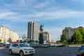 City center of Bacau on a sunny day with Hotel Moldova and Stephen the Great Statue in view. Royalty Free Stock Photo