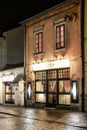 City center by night: ancient temements. Maly Rynek square in Krakow, Poland Royalty Free Stock Photo