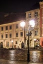 City center by night: ancient temements. Maly Rynek square in Krakow, Poland Royalty Free Stock Photo