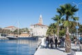 city center on the waterfront with tourists and ships Royalty Free Stock Photo