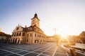 City central square (Piata Sfatului) with town council hall tower morning sunrise view, location Brasov, Transylvania, Romania. Royalty Free Stock Photo