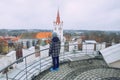 City Cesis, Latvia. Old church and man and tower with man of the new castle