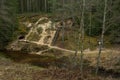 City Cesis, Latvia. Old sand cave and green moss.Travel photo