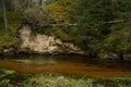 City Cesis, Latvia. Old sand cave and green moss.Travel photo