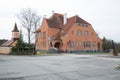 City Cesis, Latvia Republic. 17th century marriage building and street with traffic. 2. November