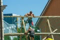 City Cesis, Latvian Republic. Run race, people were engaged in sports activities. Overcoming various obstacles and running. July