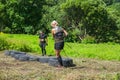 City Cesis, Latvian Republic. Run race, people were engaged in sports activities. Overcoming various obstacles and running. July