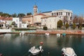 City channel and Roman Catholic Church ashore. San Giuliano, Rimini, Italy Royalty Free Stock Photo