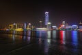 city in china is reflected in the river at night