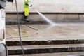 City cleaning worker cleaning street