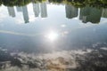 City and cloud shadows on the pool