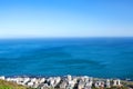 City coast with white houses view on blue sea and sky background in Cape Town, South Africa Royalty Free Stock Photo