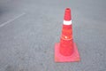 An old traffic cone on cement street ground floor Royalty Free Stock Photo