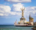 The city Constance on the Lake Constace, Bodensee. The view on the ship in the port with big statue and lighthouse. The city lies