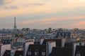 City day view of Parisian rooftops and Eiffel Tower. Famous landmark, icon, tourist destination in Paris, France. Royalty Free Stock Photo