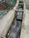 City drainage channel, made of cast concrete.