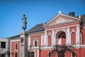 City drama theater in Klaipeda, Lithuania, where Adolf Hitler hold a speech and a monument to a German poet Royalty Free Stock Photo