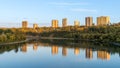 Edmonton river valley landscape with golden hour light and water reflection mix of blue and yellow colours Royalty Free Stock Photo