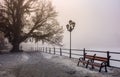 City embankment in foggy winter morning Royalty Free Stock Photo