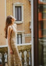 City fashion. Sensual woman on balcony. Girl outdoor. Fashionable portrait. Royalty Free Stock Photo