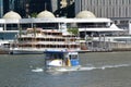 City ferry sailing over Brisbane river in Brisbane Queensland Australia