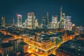 Frankfurt am Main from above, cityscape with the skyline in the evening. Illuminated streets and buildings at night Royalty Free Stock Photo